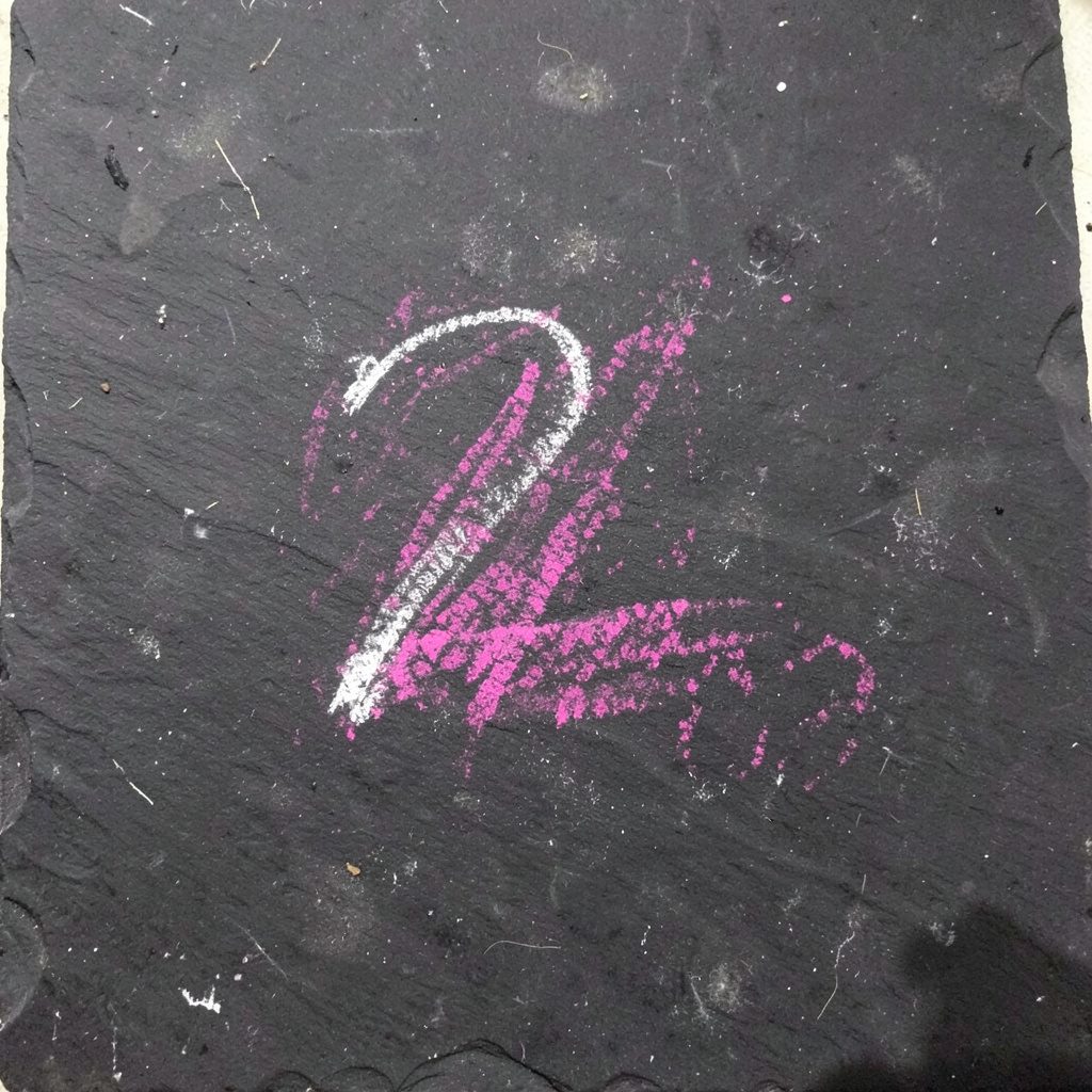 Páginas abiertas de un libro antiguo con tinta desvaída.